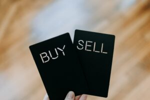 Deciding whether to buy or sell in the current market